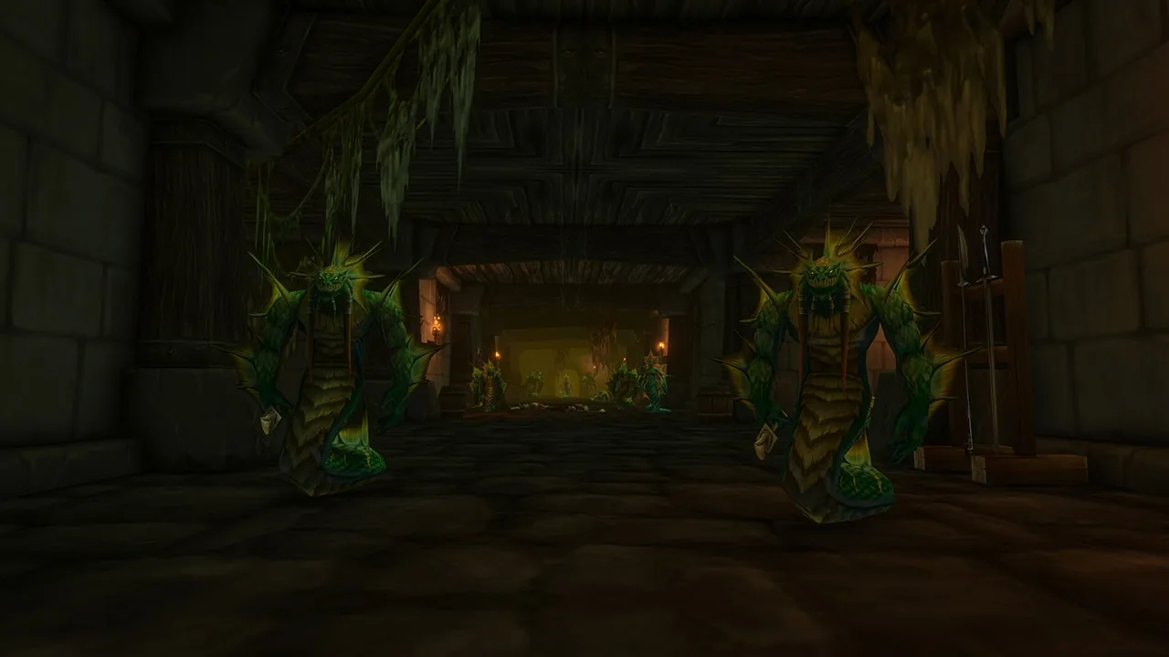 Alcaz Prison: two green figures in a dark hall