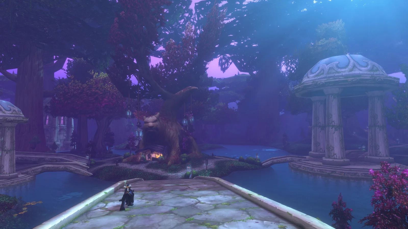Purple-lit ruins and pond at night