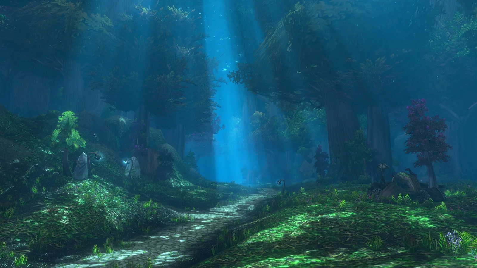 Shaft of blue light in a forest