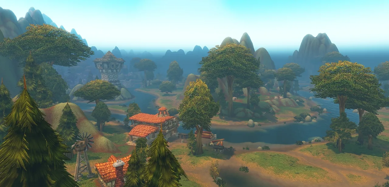 Riverglades green hills with a red-roofed village
